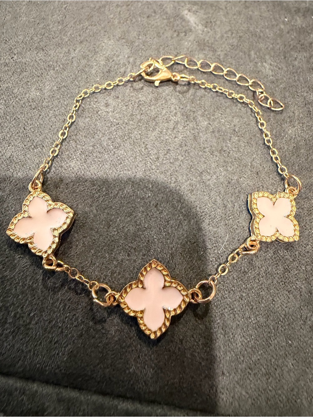 Gold Tone Bracelet with Pink Clovers